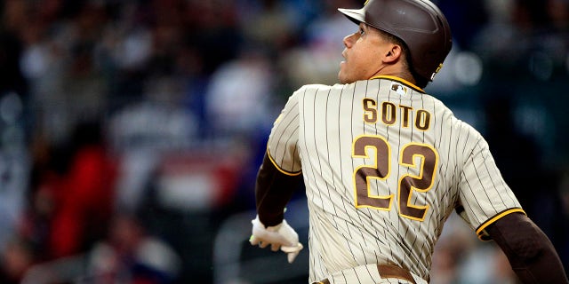San Diego Padres left fielder Juan Soto swings against the Braves on April 8, 2023, at Truist Park in Atlanta.