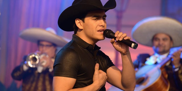 Julián Figueroa performs on the set of Univision's "Despierta America" on Aug. 28, 2015, in Miami, Florida.