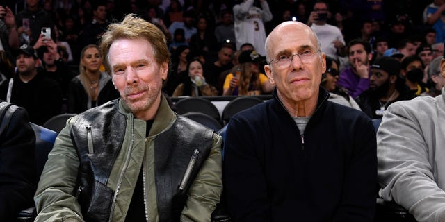 Jerry Bruckheimer (L) and Jeffrey Katzenberg attend a basketball game between the Dallas Mavericks and the Los Angeles Lakers at Crypto.com Arena on March 17, 2023 in Los Angeles, Calif.