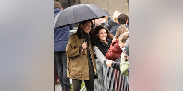 Kate Middleton poses for a photo