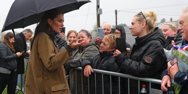 Kate Middleton talks to a crowd