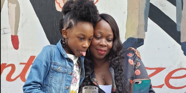 Kelsey and Keisha Morrison at a restaurant.