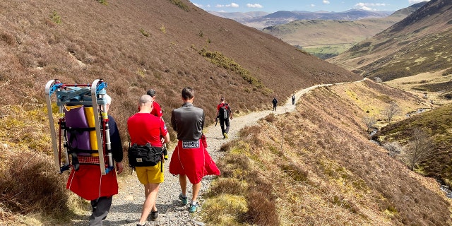 An 11-member team of rescuers was deployed to meet with the hikers after two members of the group fell ill from ingesting magic mushrooms, officials said.