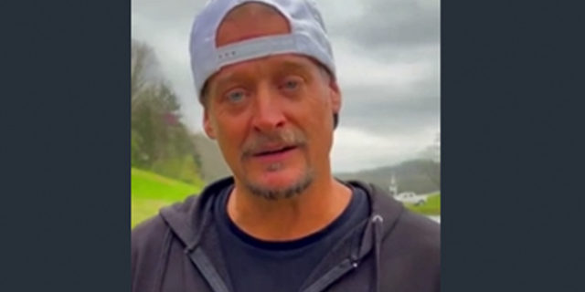 Kid Rock posts video of himself shooting cans of Bud Light in protest of the beer company naming a transgender influencer as one of its partners.
