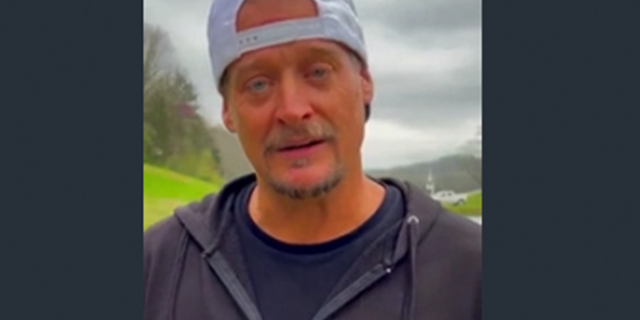 Kid Rock posts video of himself shooting cans of Bud Light in protest of the beer company naming a transgender influencer as one of its partners.