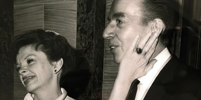 Judy Garland and Vincente Minnelli share a tender moment together at Liza Minnelli and Peter Allen’s wedding, circa 1967.