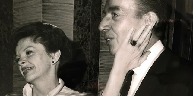 Judy Garland and Vincente Minnelli share a tender moment together at Liza Minnelli and Peter Allen’s wedding, circa 1967.