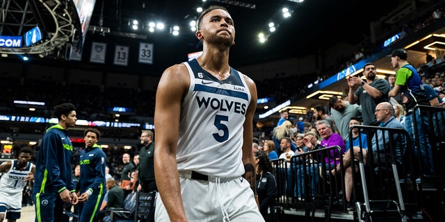 Kyle Anderson #5 of the Minnesota Timberwolves heads to the locker room after the first half of the game against the New Orleans Pelicans at Target Center on April 9, 2023 in Minneapolis, Minnesota.