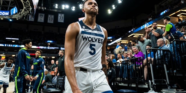 Kyle Anderson #5 of the Minnesota Timberwolves heads to the locker room after the first half of the game against the New Orleans Pelicans at Target Center on April 9, 2023 in Minneapolis, Minnesota.