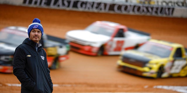 Kyle Larson, driver of the #5 HendrickCars.com Chevrolet, looks on during qualifying for the NASCAR Craftsman Truck Series Weather Guard Truck Race on Dirt at Bristol Motor Speedway on April 08, 2023 in Bristol, Tennessee.
