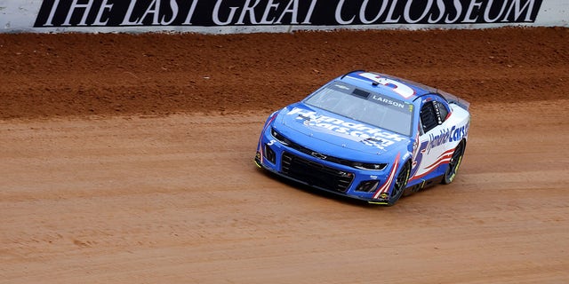 Kyle Larson, driver of the #5 HendrickCars.com Chevrolet, drives during qualifying heat #3 for the NASCAR Cup Series Food City Dirt Race on Dirt at Bristol Motor Speedway on April 08, 2023 in Bristol, Tennessee.