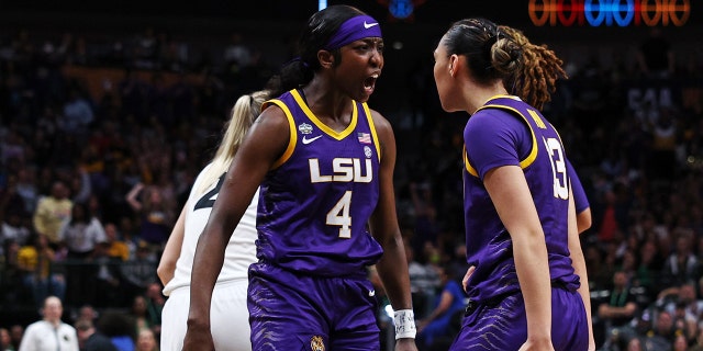 Flau'jae Johnson #4 and Last-Tear Poa #13 of the LSU Lady Tigers react during the second quarter against the Iowa Hawkeyes during the 2023 NCAA Women's Basketball Tournament championship game at American Airlines Center on April 02, 2023 in Dallas, Texas.