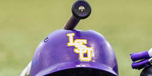 An LSU helmet rests on the sideline before a Regional Game on June 3, 2017 at Alex Box Stadium in Baton Rouge, Louisiana.