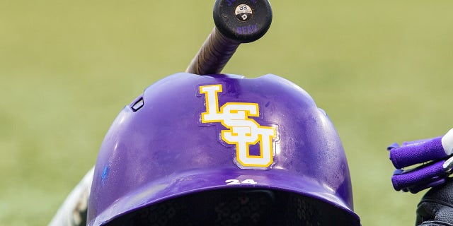 An LSU helmet rests on the sideline before a Regional Game on June 3, 2017 at Alex Box Stadium in Baton Rouge, Louisiana.