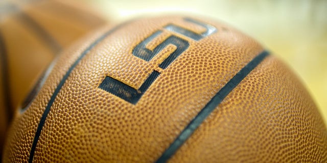 A basketball rests on the baseline during a game in Baton Rouge, La.