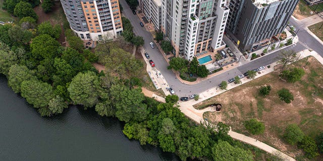 A drone shot of hike and bike trail along Lady Bird Lake