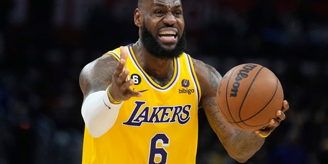 Los Angeles Lakers forward LeBron James discusses a call during the second half of the team's NBA basketball game against the Los Angeles Clippers on Wednesday, April 5, 2023, in Los Angeles.