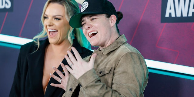 Newlyweds Lily Rose and Daira Eamon walked the red carpet at the 2023 CMT Awards, and showed off their wedding rings.