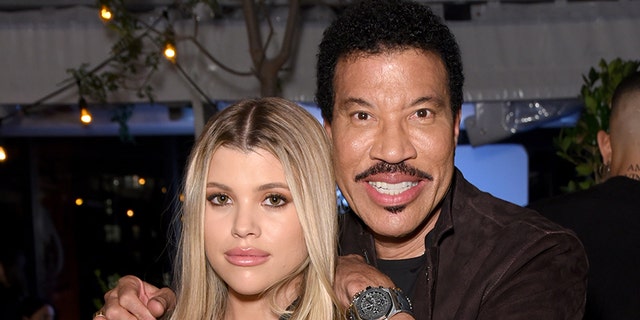 Sofia Richie and famous father Lionel Richie pose for photographs