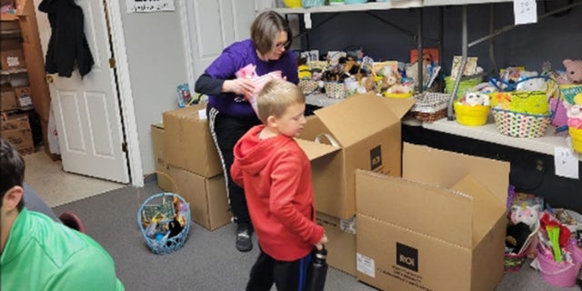 Luke Flerlage, 6, started volunteering with his parents in 2020, has been back every year, bringing in more and more supplies for the Easter Baskets.