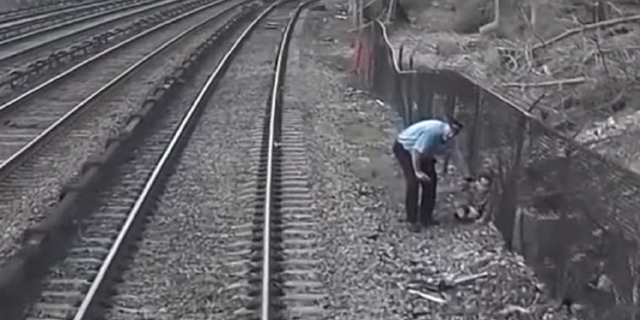 MTA worker rescues child from train tracks
