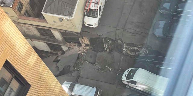 This photo provided by Charlie Franklin shows a partially collapsed parking garage in lower Manhattan's Financial District, Tuesday, April 18, 2023, in New York. Officials didn't immediately release any information on injuries. 