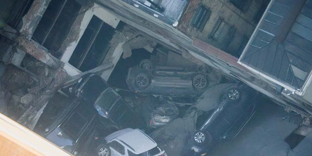 Cars are seen piled up after the collapse of a parking garage in the Manhattan borough of New York City, U.S., April 18, 2023.  