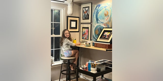 In her "creative studio," Chisholm and her children (including her 7-year-old daughter, pictured) spend time together drawing, painting, making jewelry and creating pottery.