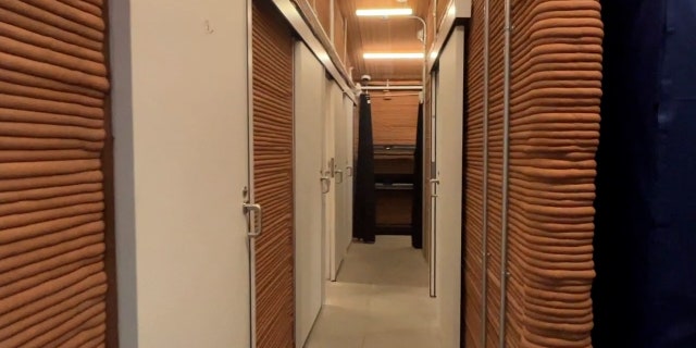 The habitat includes bedrooms and day rooms.