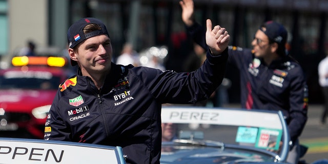Red Bull driver Max Verstappen of Netherlands waves to fans during a drivers parade ahead of the Australian Formula One Grand Prix at Albert Park in Melbourne, Sunday, April 2, 2023. 