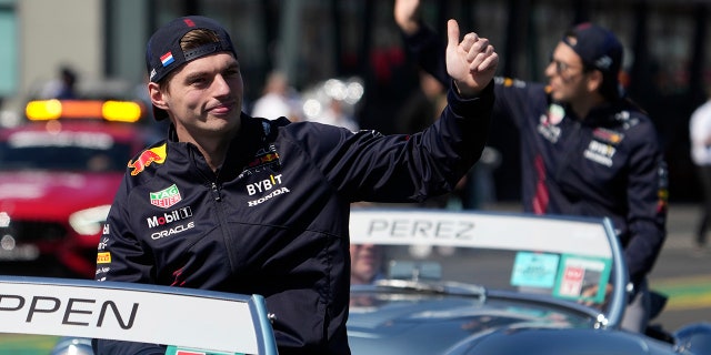 Red Bull driver Max Verstappen of Netherlands waves to fans during a drivers parade ahead of the Australian Formula One Grand Prix at Albert Park in Melbourne, Sunday, April 2, 2023. 