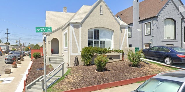 The home where Melina and Miles Armstead lived in Oakland, California, before he was fatally shot in the residence to right.