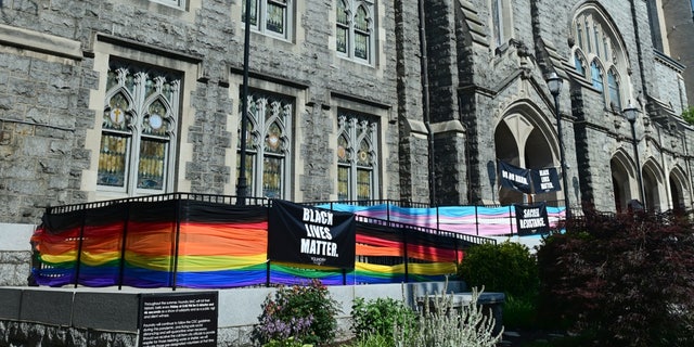 The exterior of Foundry United Methodist Church with colors of the Pride and Progress flags June 25, 2020, in Washington, D.C.