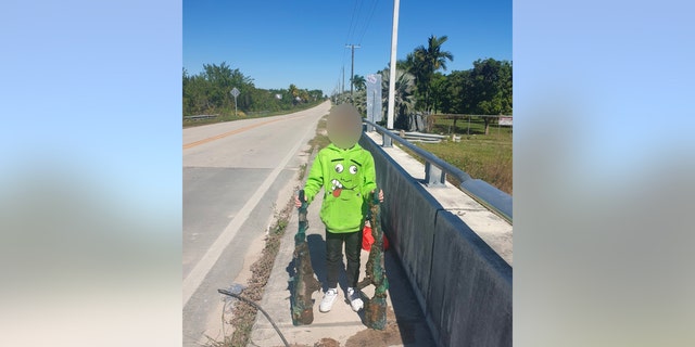 Allen Cadwalader reeled in two .50-caliber M82A1 Barrett sniper rifles from a canal in Miami-Dade County while magnet fishing with his grandfather in February 2022.