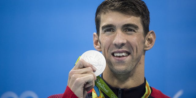 Michael Phelps with his medal