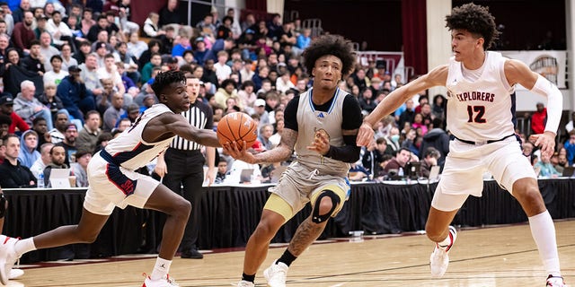 Mikey Williams of San Ysidro drives to the basket against Christopher Columbus during the Hoophall Classic high school basketball game at Blake Arena in Springfield, Mass., on Jan. 14, 2023.