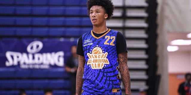 Mikey Williams looks on during a game