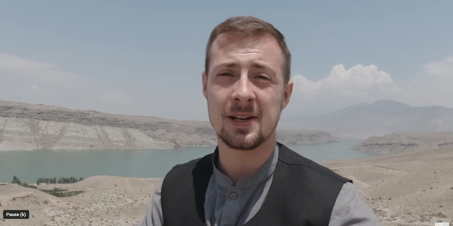 "Danger Tourist" Miles Routledge posted a video on August 18, 2022 after returning to Afghanistan and paying to shoot a weapon in the mountains. 