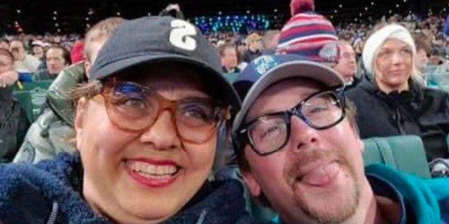 Leticia Martinez-Cosman, 58, was last seen at Fridays Seattle Mariners game, police said. She attended with the man pictured here, according to authorities.