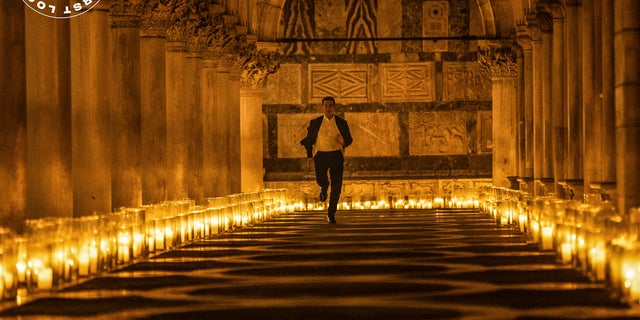 tom Cruise running in candlelit church in Mission Impossible