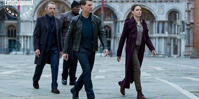 Tom Cruise, Rebecca Ferguson, Simon Pegg, and Ving Rhames in a scene from Mission: Impossible