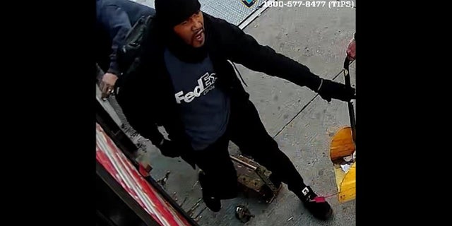 NYC robbery suspect wearing clothing with "FedEx" logo