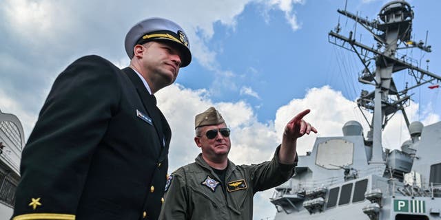 The destroyer USS Gravely moored in Poland in 2022 as it resupplies. Navy leaders have said they would be working AI more into the technology of the fleet, and said it is already being used to move ships around the world. 
