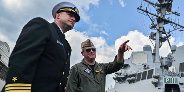 The destroyer USS Gravely moored in Poland in 2022 as it resupplies. Navy leaders have said they would be working AI more into the technology of the fleet, and said it is already being used to move ships around the world.