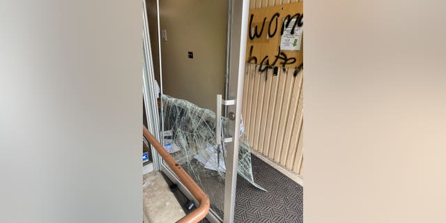 Door smashed by Maeve Nota in St. Louise Catholic Church in Bellevue, Washington.