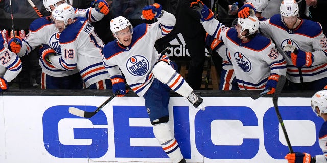 Oilers player jumps the bench