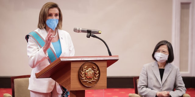 Then-House Speaker Nancy Pelosi (D-CA), left, speaks after receiving the Order of Propitious Clouds with Special Grand Cordon, Taiwan’s highest civilian honor, from Taiwanese President Tsai Ing-wen, right, at the president's office on Aug. 3, 2022, in Taipei, Taiwan.