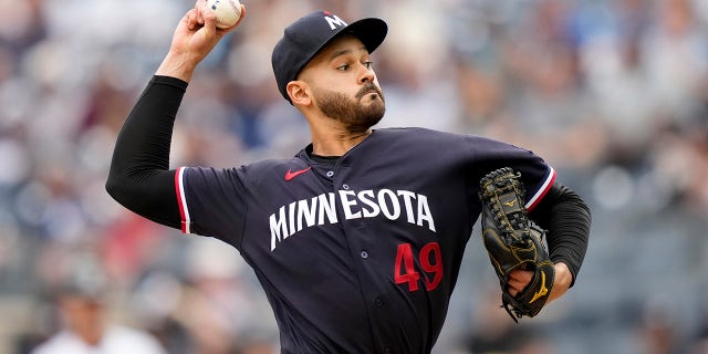 Minnesota Twins starting pitcher Pablo Lopez, #49, throws in the first inning of a baseball game against the New York Yankees, Sunday, April 16, 2023, in New York.