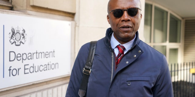 Dr. Patrick Roach, general secretary of the National Association of Schoolmasters Union of Women Teachers (NASUWT), speaks to the media outside the Department for Education in London.