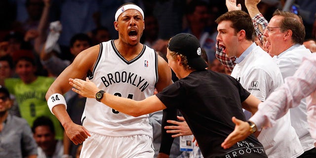 Nets' Paul Pierce celebrates after making a basket against the Miami Heat during the Eastern Conference semifinals at Barclays Center on May 12, 2014 in Brooklyn.